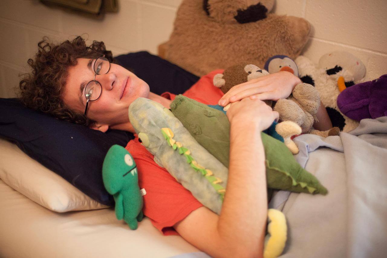 Maxwell Green, class of 2020, displays his collection of stuffed animals