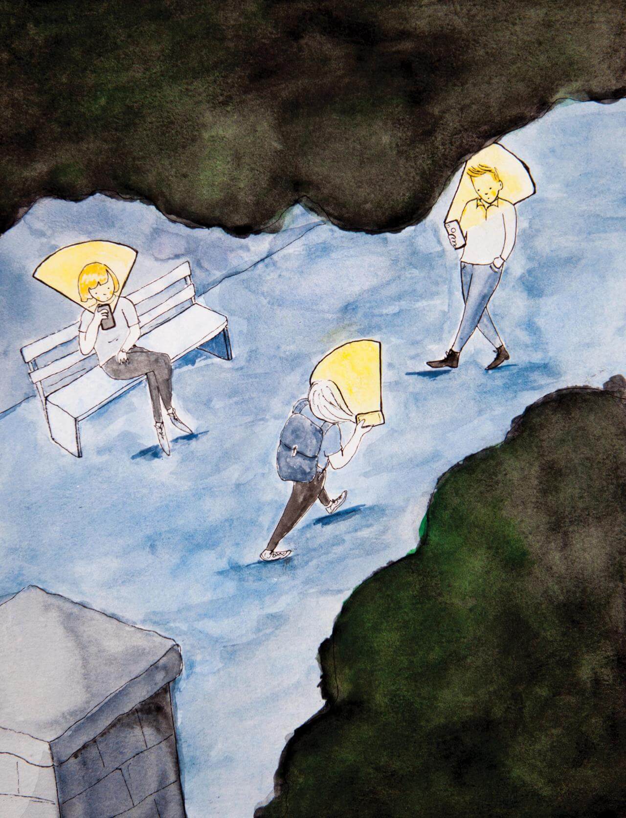Three students on Middle Path, all looking at their phones